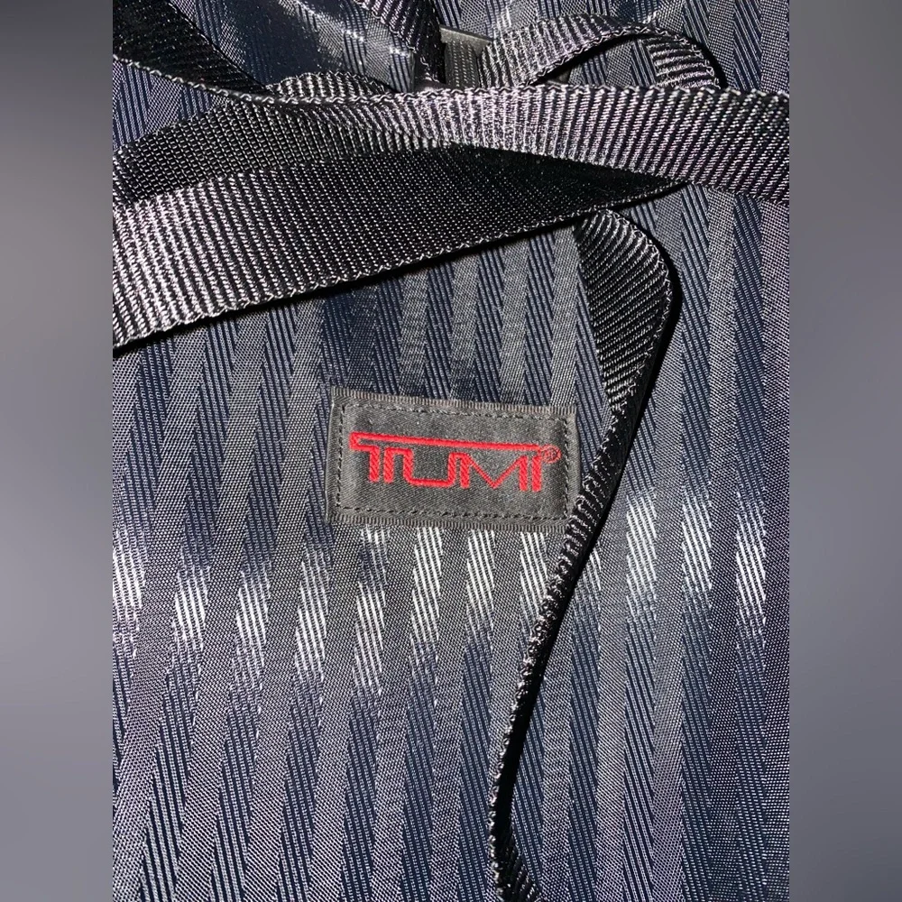 TUMI Check On Suitcase